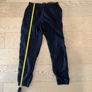 Adidas blue track joggers with flower design